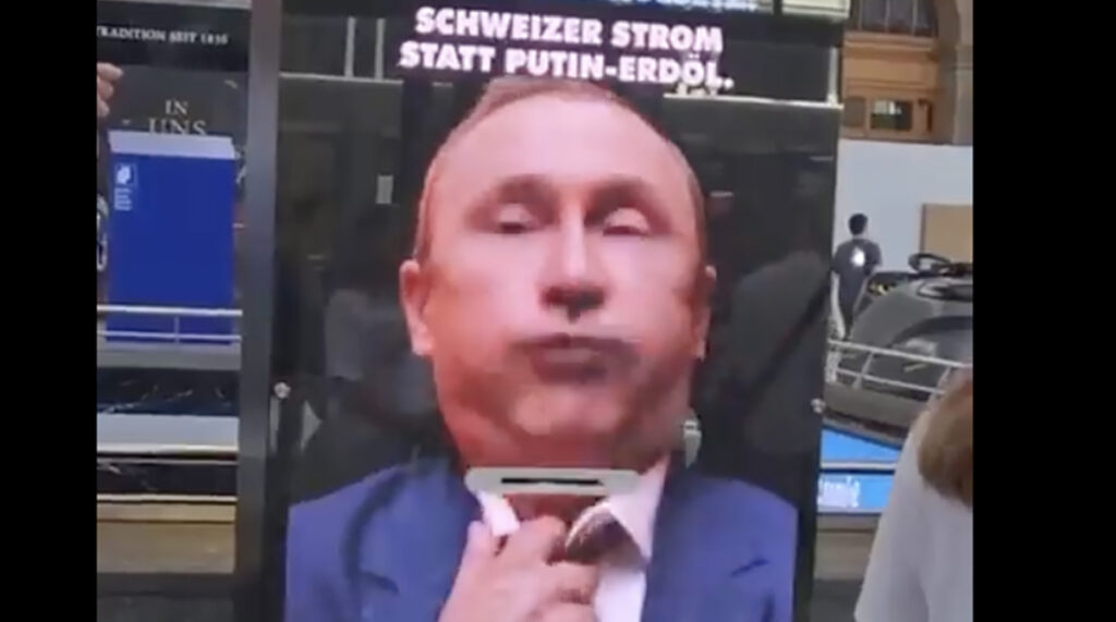 VIDEO: Šveitsis pandi üles Putini kujutisega stendid